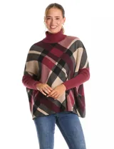 Polera estilo poncho de corte oversize, con cuello alto tejido y mangas largas con puños elásticos. Presenta un diseño de estampado a cuadros en tonos bordó, beige y negro.