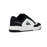 Championes Quiksilver modelo Ride, color blanco y negro, de diseño urbano con cordones y suela de goma.