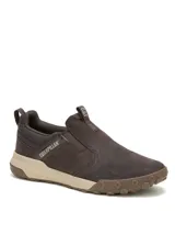 Zapato tipo slip-on Caterpillar modelo Hex Ready, confeccionado en cuero nubuck color marrón. Presenta diseño sin cordones con elásticos laterales, entresuela de EVA en tono beige y suela de goma con relieve para mayor tracción.