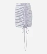 Minifalda color lila de satén con fruncido lateral y cordones ajustables.