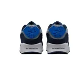 Championes Nike Air Max 90 SE, con capellada gris y detalles en azul marino y azul eléctrico. Presentan el logo de Nike en color plateado y suela blanca con cámara de aire visible.