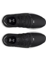 Championes Under Armour modelo Phantom X, de diseño deportivo y futurista. Presentan una parte superior de tejido transpirable en color negro, con estructura de TPU en el mediopié para mayor soporte y una entresuela de espuma supercrítica en color gris claro. Incluyen el logo de la marca en el lateral y una suela de goma con tracción superior.
