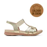 Sandalia plana Usaflex modelo Catri de cuero color dorado, con tiras cruzadas en el empeine y ajuste elástico.