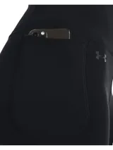 Calza deportiva Under Armour de tiro alto, confeccionada en tejido de doble punto ultrasuave y elástico en cuatro direcciones. Cuenta con pretina ancha y plana, y bolsillo lateral integrado.