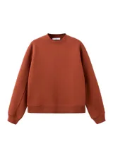 Jersey de punto color terracota, con cuello redondo, manga larga y puños y dobladillo en canalé.