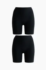 Pack de dos culottes tipo biker de tiro alto con efecto moldeador en cintura, caderas y glúteos. Confeccionados en tejido elástico seamless con refuerzo interior.
