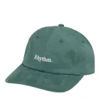 Gorra de visera curva color verde, con el logo de la marca 'Rhythm.' bordado en blanco en el frente.