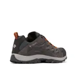 Championes de trekking Columbia modelo Crestwood, color gris con detalles en negro y naranja. Confeccionados con tecnología Omni-Tech impermeable y transpirable, entresuela TechLite para amortiguación y suela Omni-Grip para tracción en todo terreno.