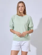 Buzo verde agua en jersey, marca Zac & Rachel, de manga raglán.