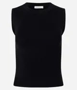 Blusa sin mangas color beige confeccionada en tejido de punto con textura acanalada y cuello redondo.