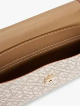 Cartera mensajera con estampado integral del monograma TH, cierre a presión, asa superior extraíble y correa ajustable y extraíble.