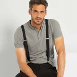 Tirantes negros con pinzas metálicas plateadas.