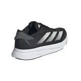 Championes de running Adidas Adizero SI2, color negro con detalles en blanco y gris. Cuentan con amortiguación Lightstrike Pro y exterior de malla técnica. Contienen al menos un 20 % de material reciclado.