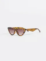 Lentes de sol con montura cat-eye estampada en tonos marrones y amarillos, y lentes marrones degradé.
