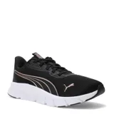 Championes deportivos Puma modelo Flex Focus Lite Modern, color negro con detalles en tono cobre metalizado. Presentan capellada de malla transpirable, cierre con cordones y suela blanca de goma con diseño flexible.