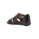 Sandalia baja combinada de cuero en color celeste con detalles en marrón tostado, tira con hebilla lateral ajustable y suela texturizada.