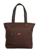 Cartera tipo tote con diseño patchwork que combina paneles de tela estampada con motivos geométricos y florales en tonos tierra, burdeos y azul, con detalles en cuero sintético marrón. Cuenta con manijas fijas, cierre principal con cremallera y un llavero decorativo con borlas y cuentas colgando de uno de los laterales.