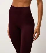 Legging deportiva Get Over de tiro alto, confeccionada en poliamida seamless con diseño ajustado al cuerpo y acabado liso.
