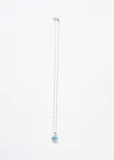 Collar de plata 925 con cadena tipo singapur y dije colgante en forma de corazón con piedra turquesa central rodeada de zirconias.
