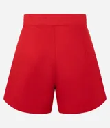 Short pollera de cintura alta confeccionado en sarga color rojo, con traspase sobre y botón diferenciado.