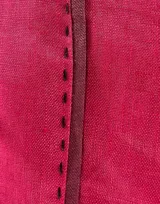 Pantalón de lino color fucsia, de corte palazzo y tiro alto.