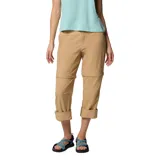 Pantalón convertible beige de tiro medio, con tecnología Omni-Shade y Omni-Shield, diseño desmontable que se convierte en shorts, bolsillos laterales y rodilleras articuladas.