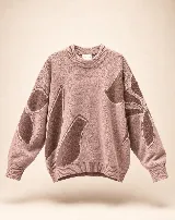 Buzo tejido de algodón y acrílico, color rosado con diseño floral en tonos marrones, de silueta amplia, cuello alto y terminaciones acanaladas.