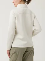 Campera polar color crema con cierre frontal completo, cuello alto y bolsillo con cierre en la manga izquierda.