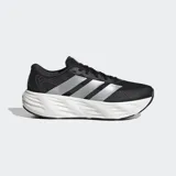 Championes de running Adidas Galaxy 8, de color negro con las tres tiras plateadas en el lateral y una suela gruesa de amortiguación blanca.