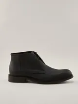 Botas de cuero marrón de caña baja con cordones y suela con costura visible, de la marca Benson & Thomas, modelo Morus 5.0.