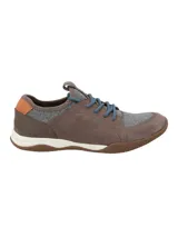 Championes urbanos Hush Puppies modelo Space, con diseño combinado en cuero marrón y paneles de tejido gris. Presentan cordones azules, suela de goma antideslizante y entresuela de EVA para mayor amortiguación.