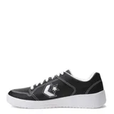 Championes urbanos Converse modelo Day One Court Ox, color negro con costuras blancas visibles y suela de goma blanca. Presenta el logo de la marca en el lateral y cordones blancos.