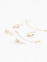 Set de tres pares de aros dorados con forma de estrella.