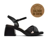 Sandalias de vestir de cuero negro, con tiras cruzadas en el empeine, tira con hebilla al tobillo y taco cuadrado.
