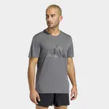 Remera deportiva Adidas de manga corta y cuello redondo, color gris. Presenta el logo de la marca en el pecho con un diseño gráfico texturizado. Confeccionada con tecnología Climacool para mayor transpirabilidad y detalles reflectantes.