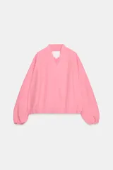 Chaqueta bomber ZW Collection de corte cruzado con escote en pico, manga larga abullonada con puños elásticos y bolsillos delanteros.