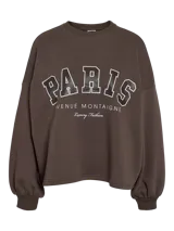 Buzo color chocolate brown con estampado frontal que dice "PARIS AVENUE MONTAIGNE Luxury Fashion". Tiene puños y ruedo acanalados.