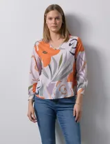 Blusa azul marino de gasa con escote en V y mangas largas con puño. Marca Sioni.