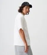Remera boxy de algodón color negro, con cuello mock neck y mangas cortas, marca Blue Steel.