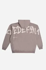 Campera con capucha de algodón con efecto acid wash, corte oversize y estampa trasera con tipografía estilo graffiti.