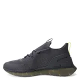 Championes Topper Styl grises con detalles en amarillo lima, de estilo running y capellada tejida.