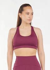 Top deportivo color borgoña con espalda estilo nadador y copas removibles.