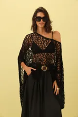 Sweater de tejido de punto calado con diseño de red, de corte asimétrico y estilo holgado, ideal para superposiciones.