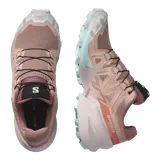 Calzado de trekking Salomon modelo Speedcross 6, en tonos gris y verde claro, diseñadas para trail running con suela de gran tracción y cordones de ajuste rápido.
