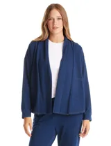 Cardigan abierto de denim, de corte holgado y recto, con solapas amplias, bolsillos frontales funcionales y hombros caídos.