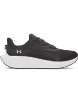 Championes de running Under Armour modelo W Ascend, color negro con entresuela blanca. Presentan una parte superior de malla liviana y transpirable con tecnología Charged Cushioning para mayor amortiguación y respuesta.