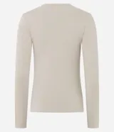 Blusa de manga larga y cuello redondo, confeccionada en mezcla de algodón y elastano.