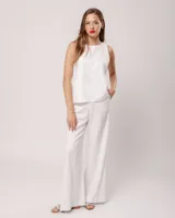 Musculosa blanca de lino con escote redondo y corte a la cadera.