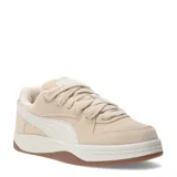 Championes urbanos Puma modelo Park Luna SD, con diseño inspirado en el skate. Presentan una capellada de gamuza negra con la icónica franja lateral de Puma en color blanco, cordones gruesos, entresuela de goma color crema y suela de caucho en tono caramelo.