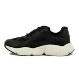 Championes deportivos Vizzano de color negro con suela gruesa en tono blanco off-white, diseño acordonado y detalles en malla y material sintético.